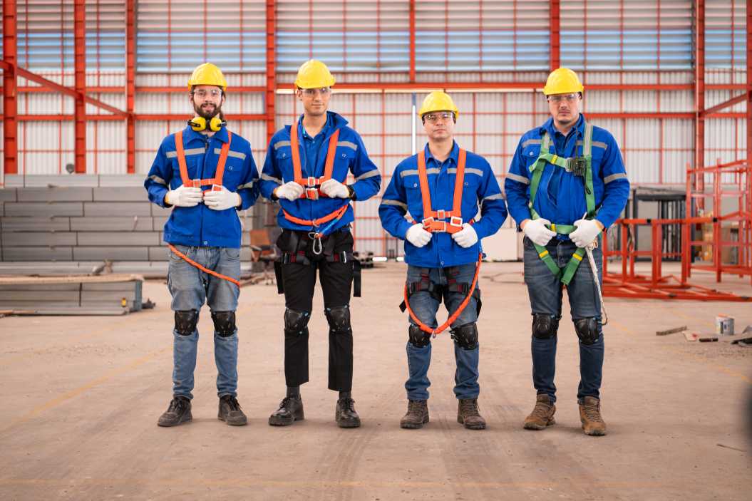 Portrait of a team of industrial workers who know where to buy PPE